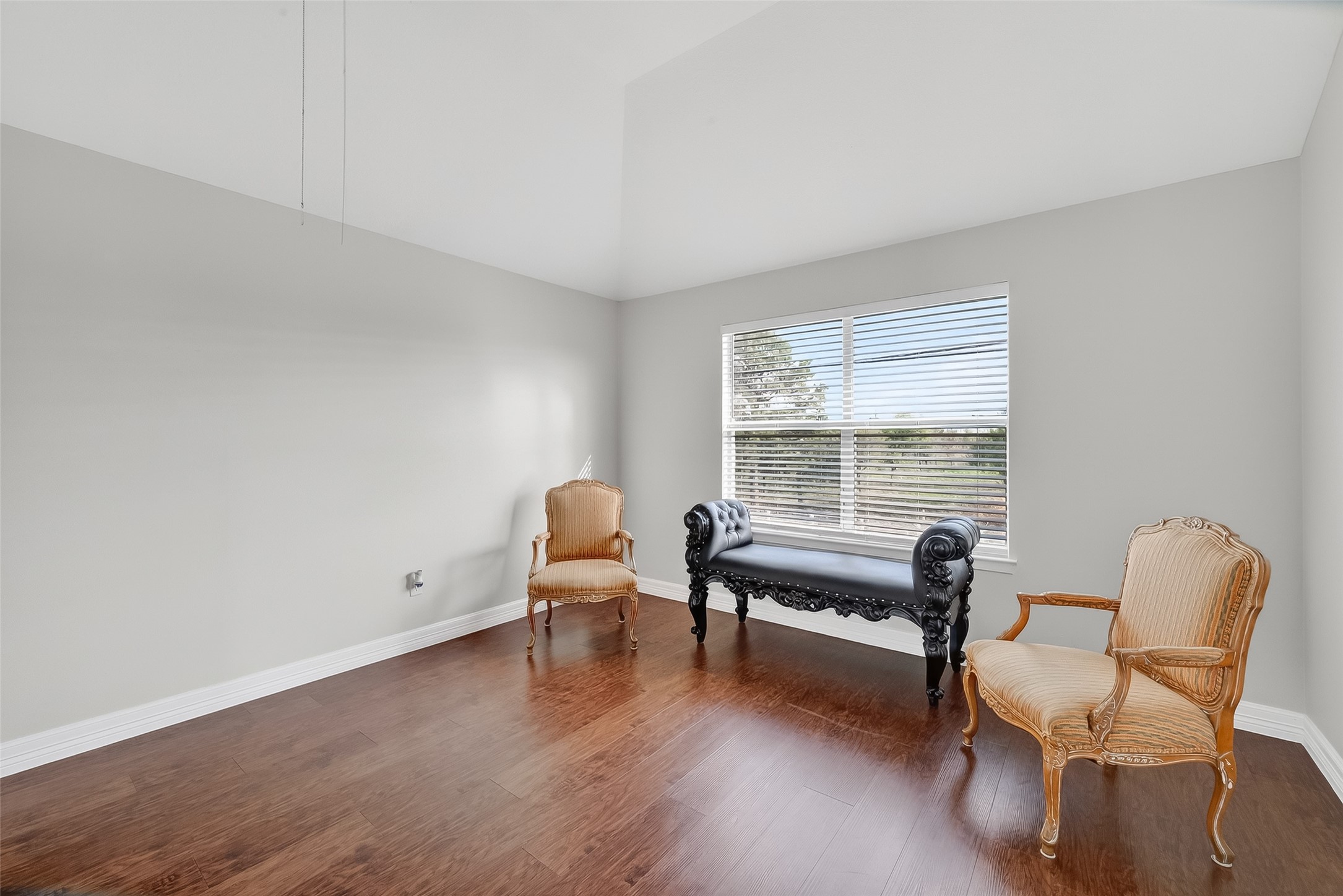 5902 Camron Point Circle Katy, TX 77449 - Photo 33 of 44 Versatile sixth bedroom features a large window that fills the space with natural light and offers generous room space.