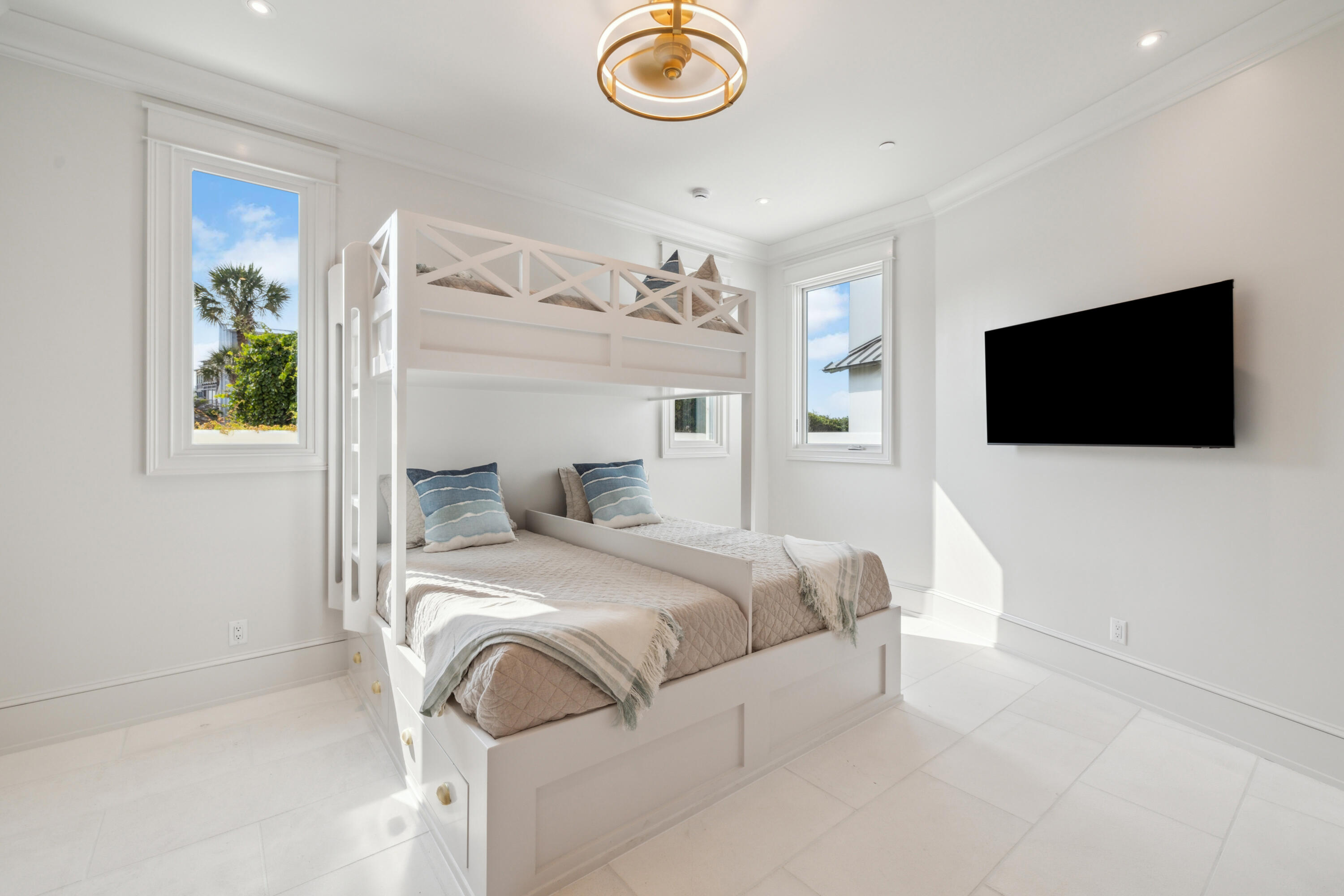 31 Sea Walk Circle Santa Rosa Beach, FL 32459 - Photo 13 of 50 a bedroom with a bed and a flat screen tv