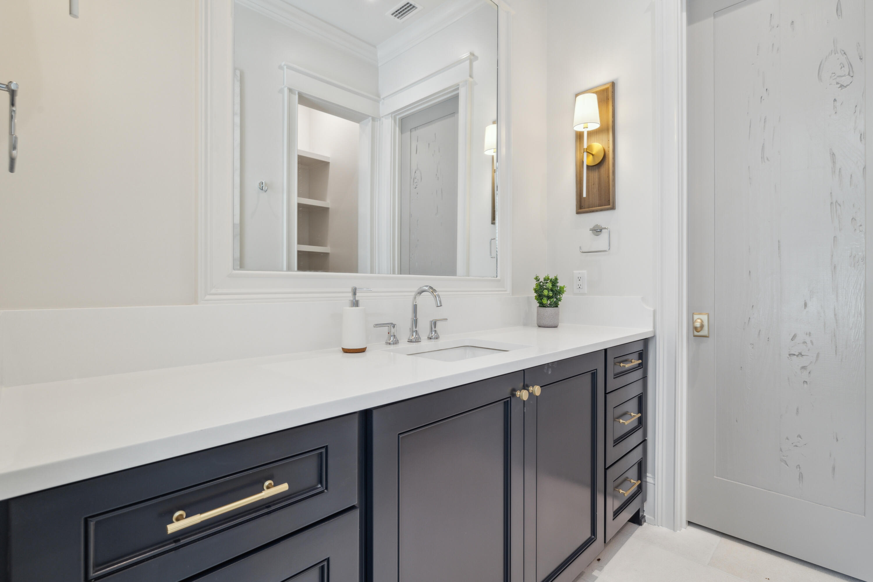 31 Sea Walk Circle Santa Rosa Beach, FL 32459 - Photo 17 of 50 a bathroom with a sink and a mirror