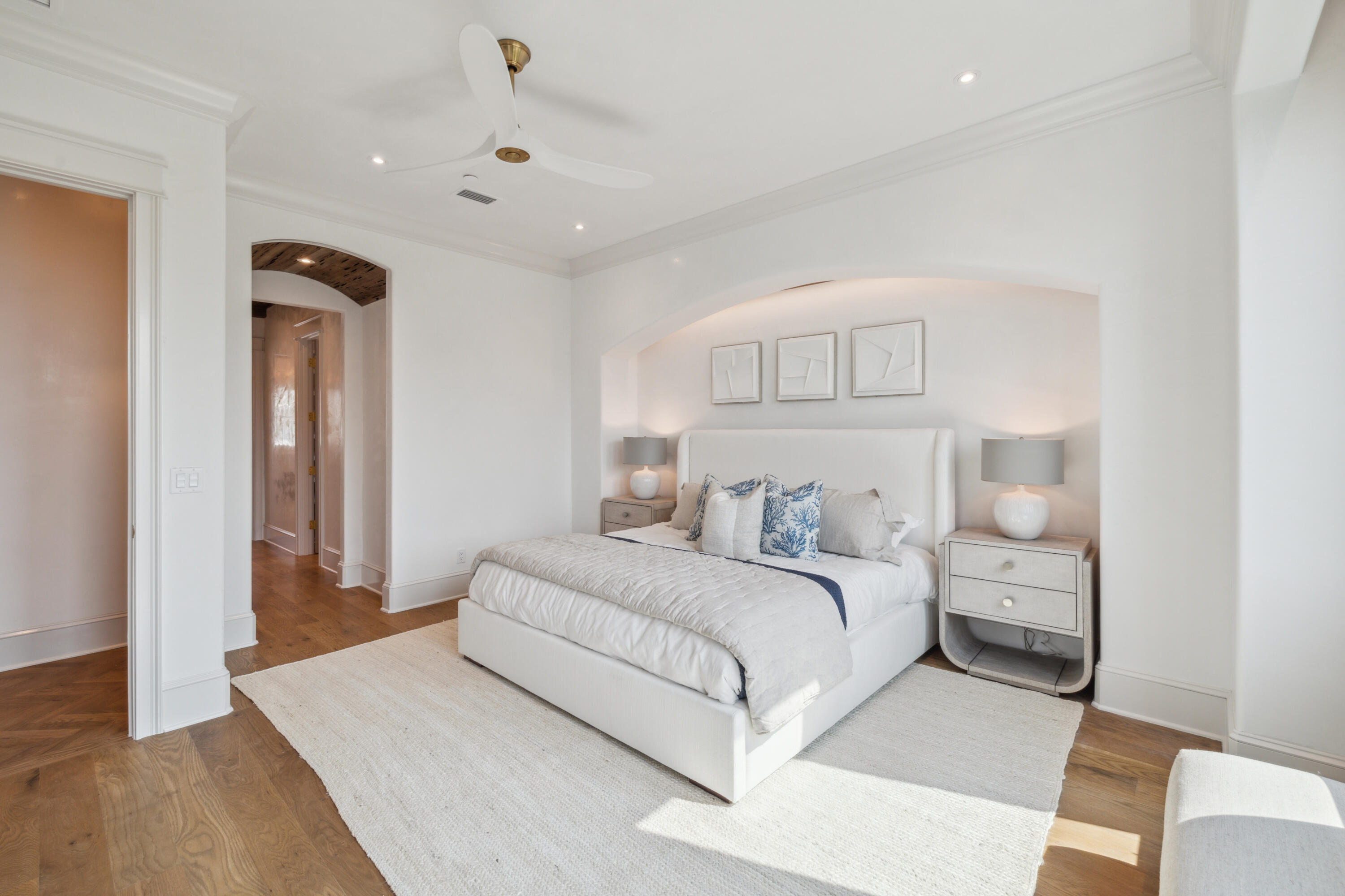 31 Sea Walk Circle Santa Rosa Beach, FL 32459 - Photo 22 of 50 a bedroom with a large bed and a chandelier