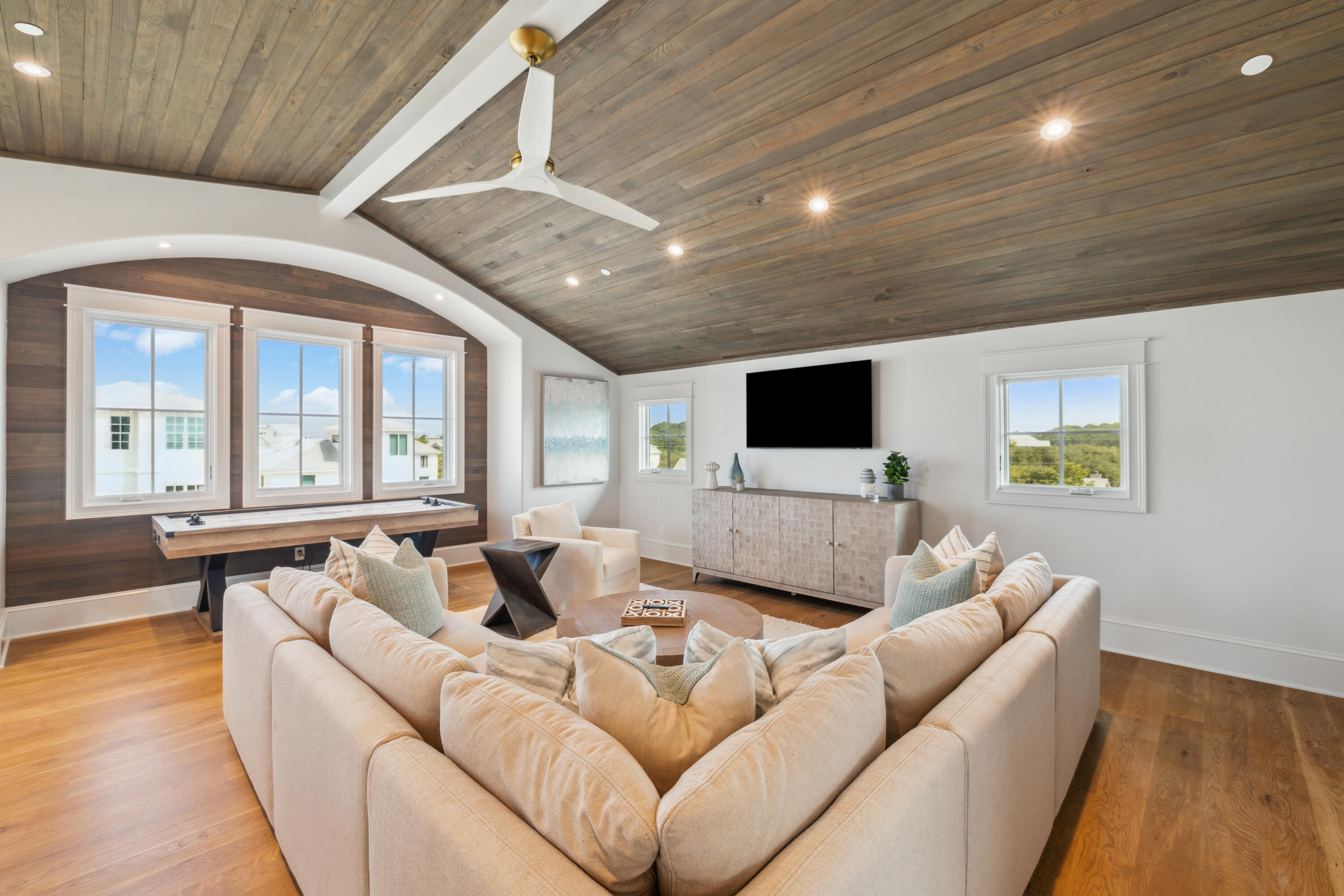 31 Sea Walk Circle Santa Rosa Beach, FL 32459 - Photo 38 of 50 a living room with furniture and a flat screen tv