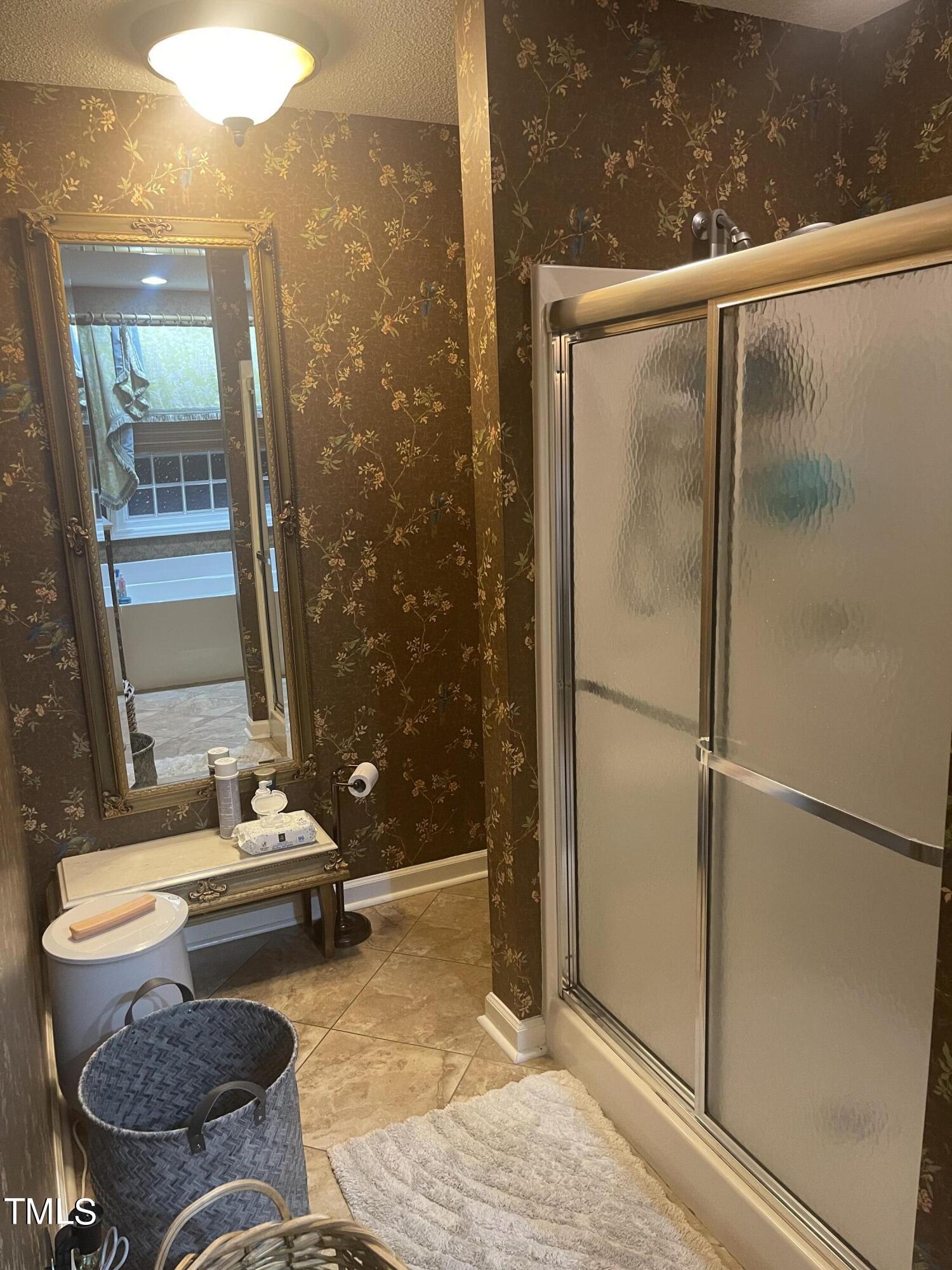 104 Chadbury Drive Dunn, NC 28334 - Photo 20 of 23 a bathroom with a granite countertop sink and a mirror