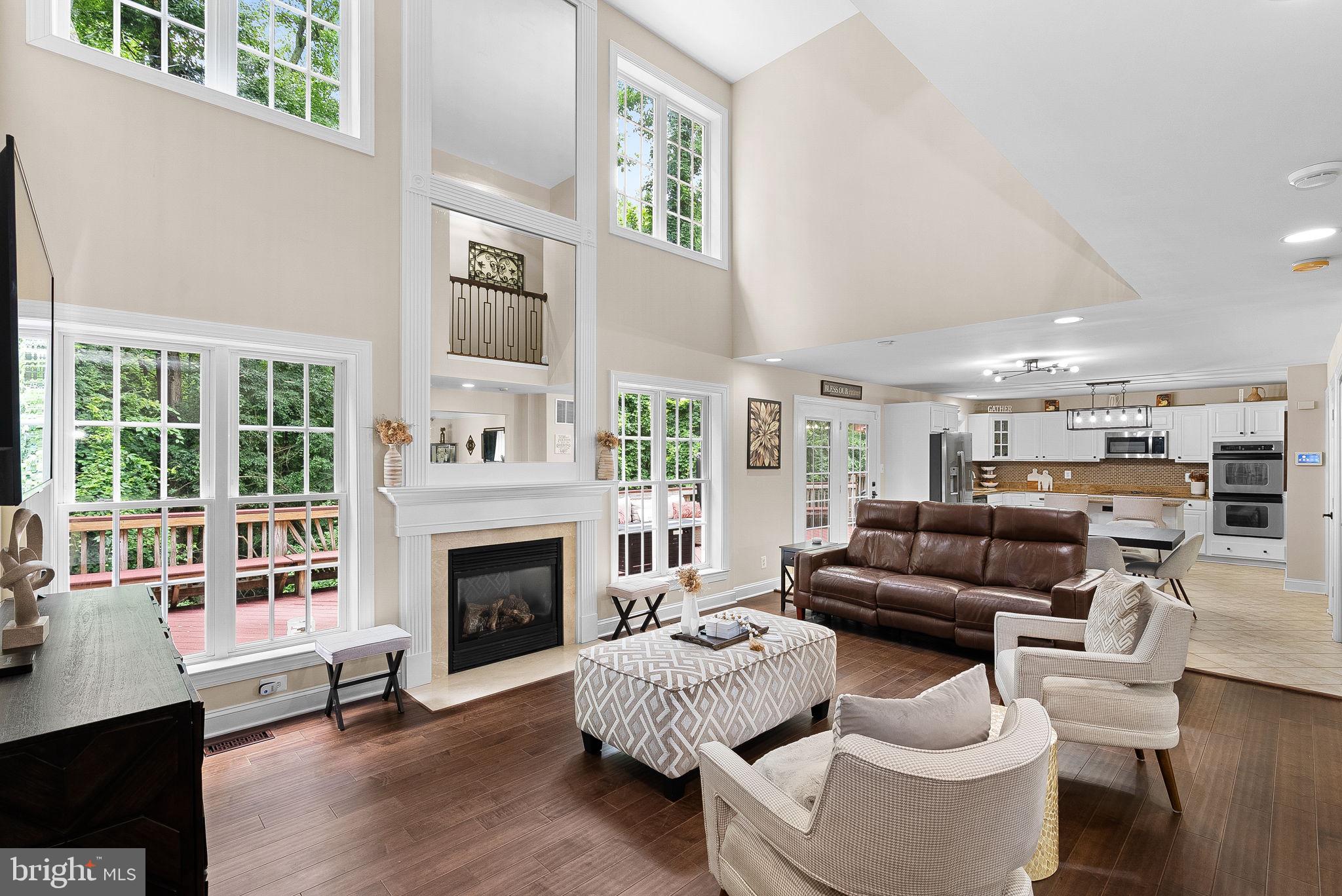 7214 Calamo Street Springfield, VA 22150 - Photo 19 of 77 Great room with fireplace