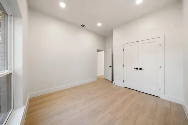 a view of small space with wooden floor