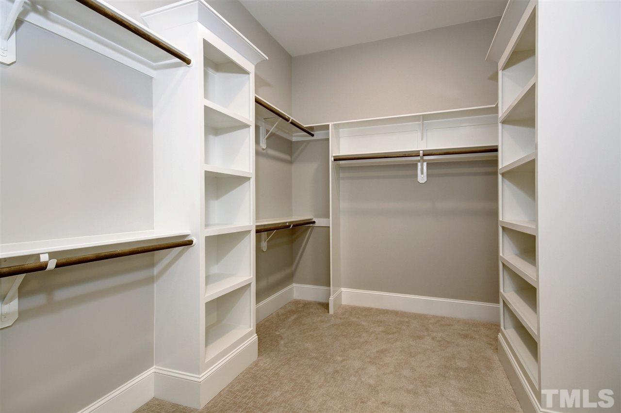 8912 Ashton Garden Way Raleigh, NC 27613 - Photo 14 of 30 a view of an empty walk in closet