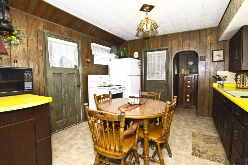 3968 Hunter Road Poplar Grove, IL 61065 - Photo 11 of 25 a dining room with furniture and window
