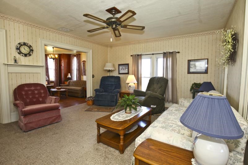 3968 Hunter Road Poplar Grove, IL 61065 - Photo 14 of 25 a living room with furniture and a large window