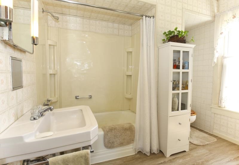 3968 Hunter Road Poplar Grove, IL 61065 - Photo 18 of 25 a bathroom with a sink a toilet and shower