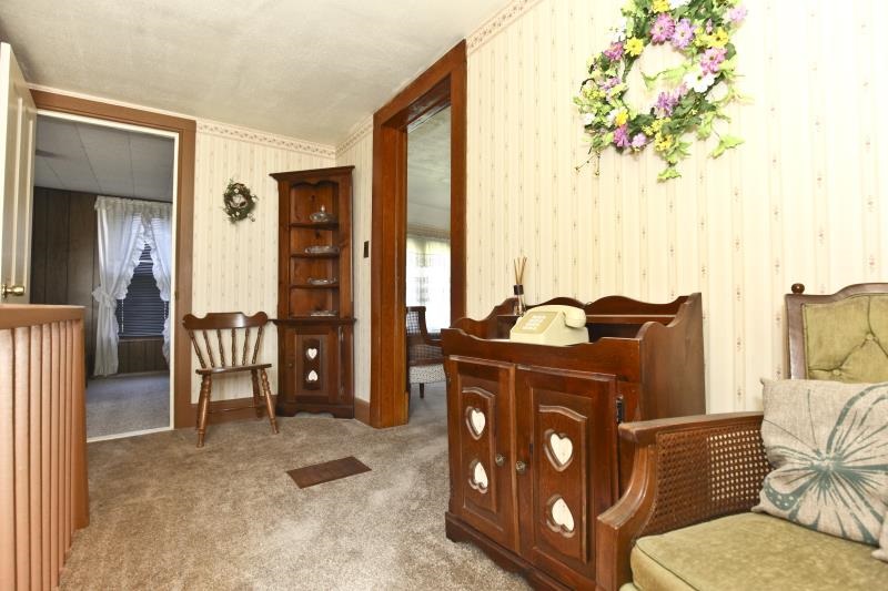 3968 Hunter Road Poplar Grove, IL 61065 - Photo 20 of 25 a living room with furniture and a flat screen tv