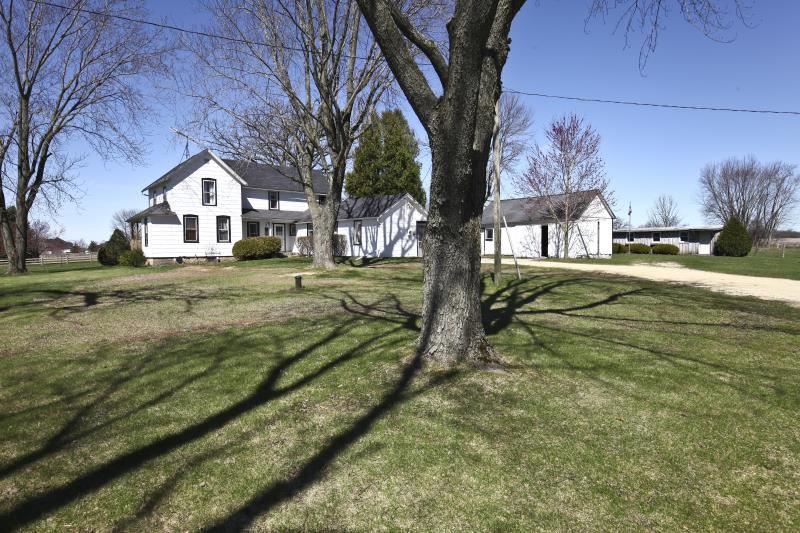 3968 Hunter Road Poplar Grove, IL 61065 - Photo 4 of 25 a view of a house with a yard