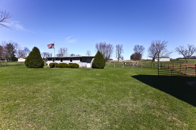 3968 Hunter Road Poplar Grove, IL 61065 - Photo 8 of 25 a view of a golf course with a lake