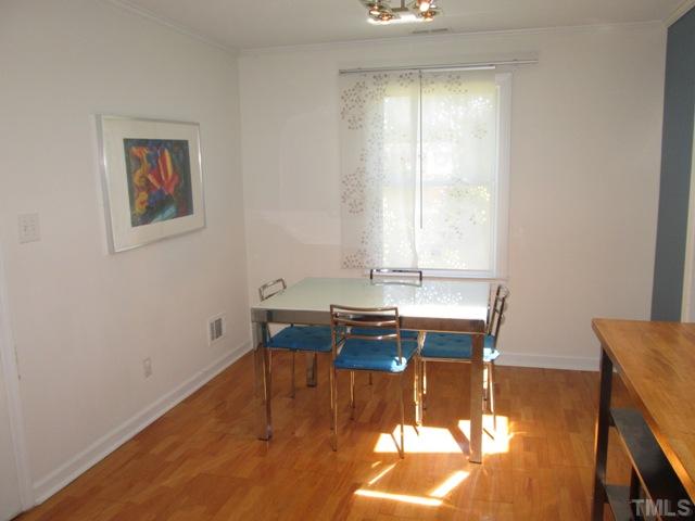 3409 Astro Court Raleigh, NC 27604 - Photo 15 of 25 This fantastic breakfast and dining room space features hardwood floors, is nice and bright, and perfectly located, being open to kitchen for ease in serving meals to friends and family!
