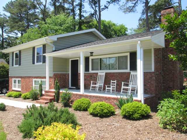3409 Astro Court Raleigh, NC 27604 - Photo 3 of 25 REAL Rocking chair front porch to relax and enjoy those spring and summer nights! This entire lot had a professional landscape layout as you can tell and it looks great! NEW Outside lights!