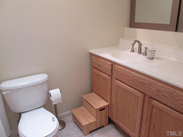 3409 Astro Court Raleigh, NC 27604 - Photo 22 of 25 This second full bath been redone and updated and features a skylight, updated cultured marble counter top with adult height vanity, composite tile like flooring, and tiled tub!