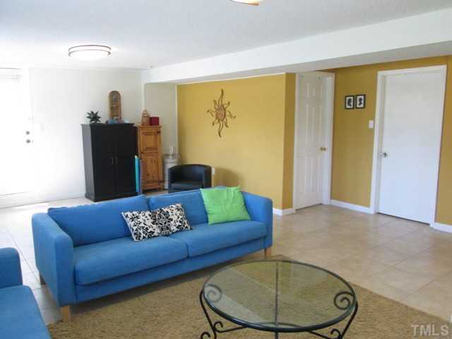 3409 Astro Court Raleigh, NC 27604 - Photo 24 of 25 The lower level family/great room features tile flooring, crown molding, updated lights, has its own HVAC too! Fourth bedroom and laundry/utility room is located on the lower level and there is a side entry to the lower level also!