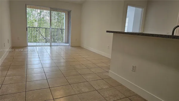 $2,000 | 8040 North Nob Hill Road, Unit 303, Tamarac, FL 33321