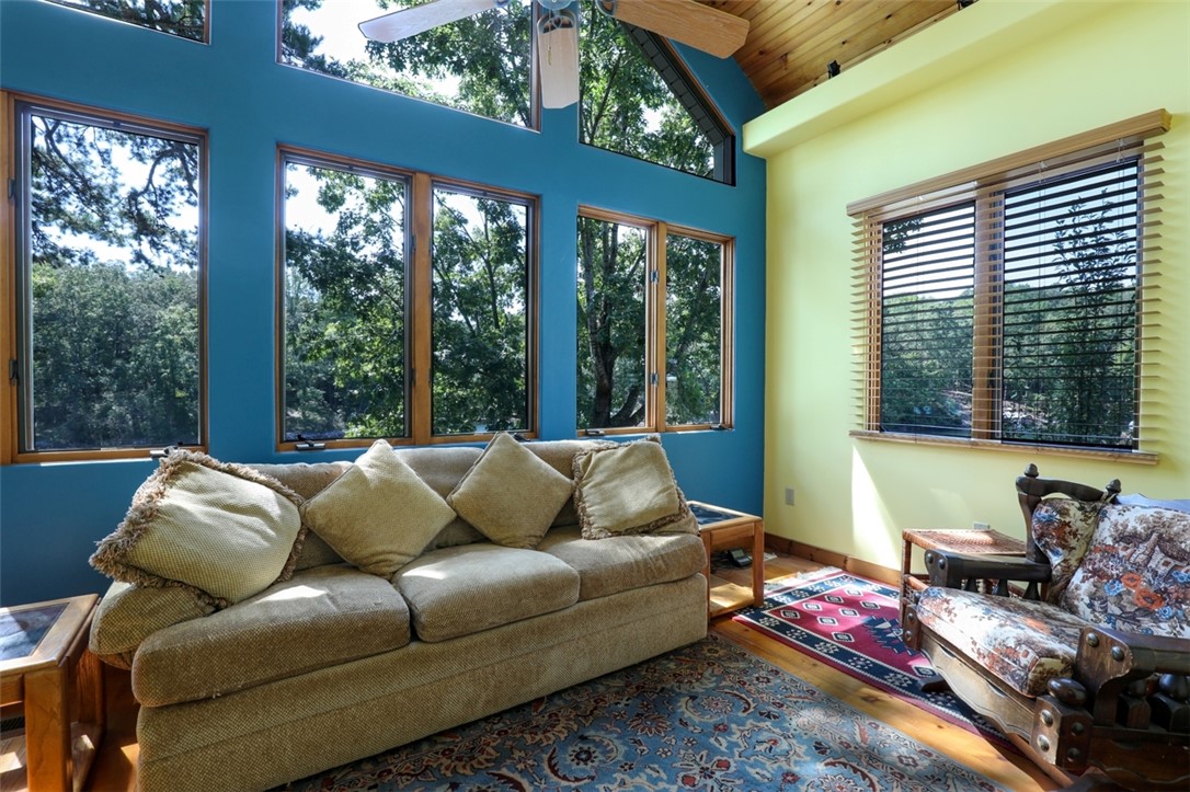 3 Horizon Pointe Lane Salem, SC 29676 - Photo 10 of 30 This airy room offers expansive views and warm wood flooring.