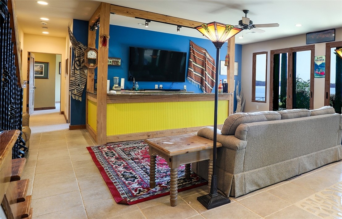 3 Horizon Pointe Lane Salem, SC 29676 - Photo 21 of 30 Bright and inviting living area with scenic water views through expansive glass doors.