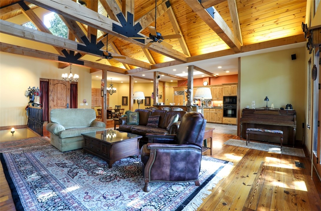 3 Horizon Pointe Lane Salem, SC 29676 - Photo 4 of 30 This expansive great room seamlessly blends rustic charm with comfortable living.