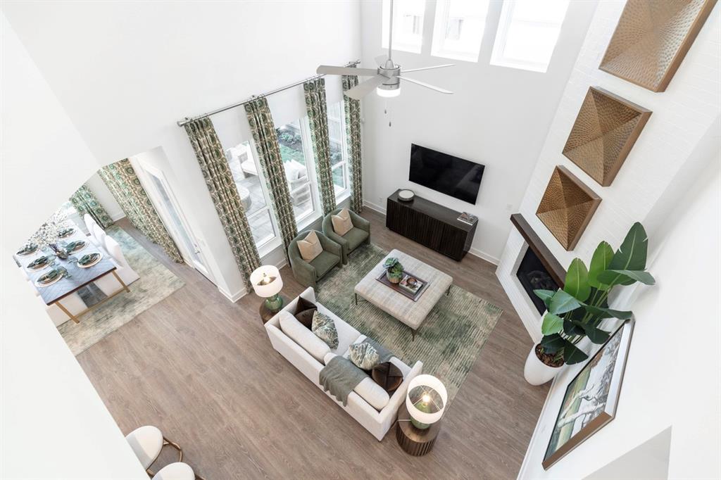 11505 Hardwick Road Haslet, TX 76052 - Photo 12 of 39 a living room with furniture and a flat screen tv
