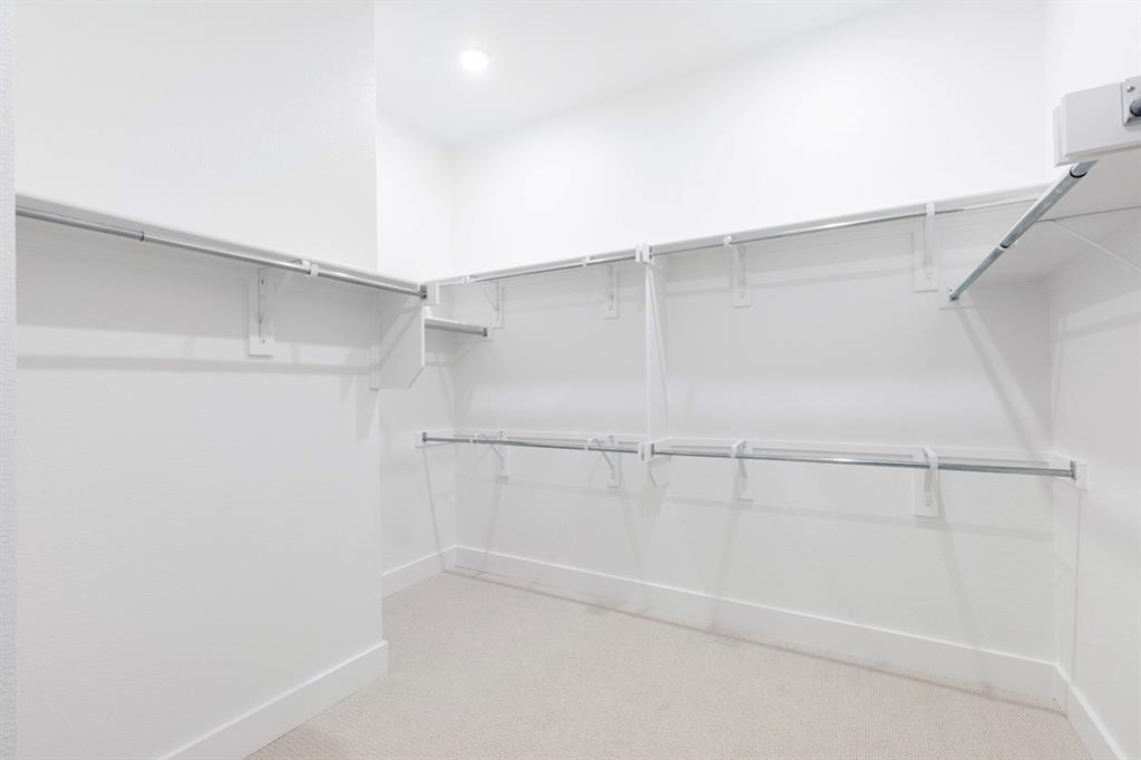 11505 Hardwick Road Haslet, TX 76052 - Photo 20 of 39 a view of an empty walk in closet