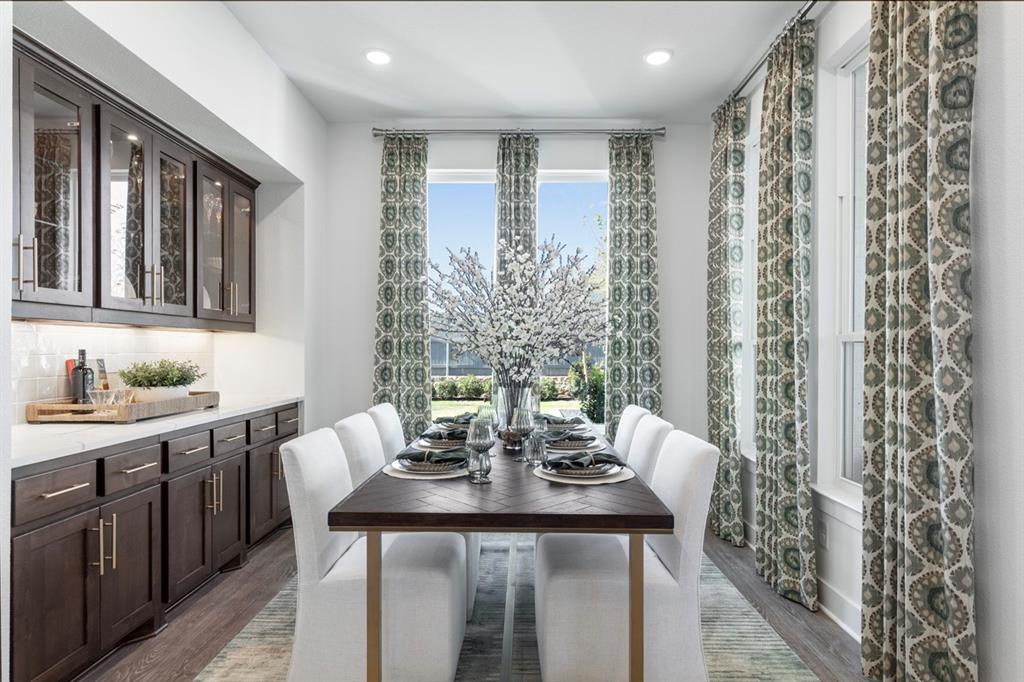 11505 Hardwick Road Haslet, TX 76052 - Photo 25 of 39 a view of a kitchen with a sink and dining table