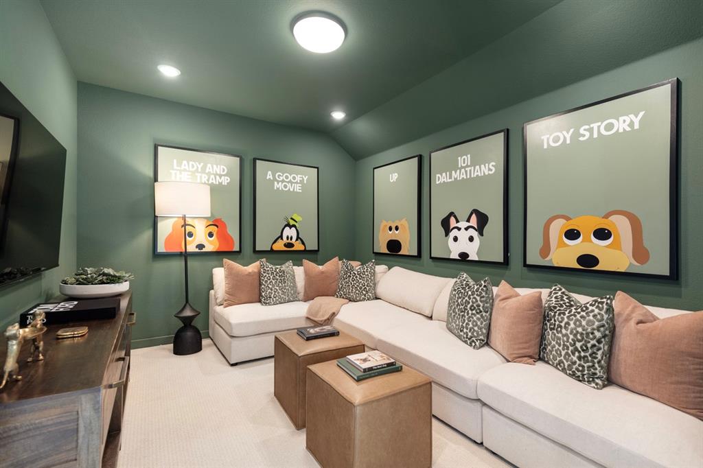 11505 Hardwick Road Haslet, TX 76052 - Photo 34 of 39 a living room with furniture and a flat screen tv