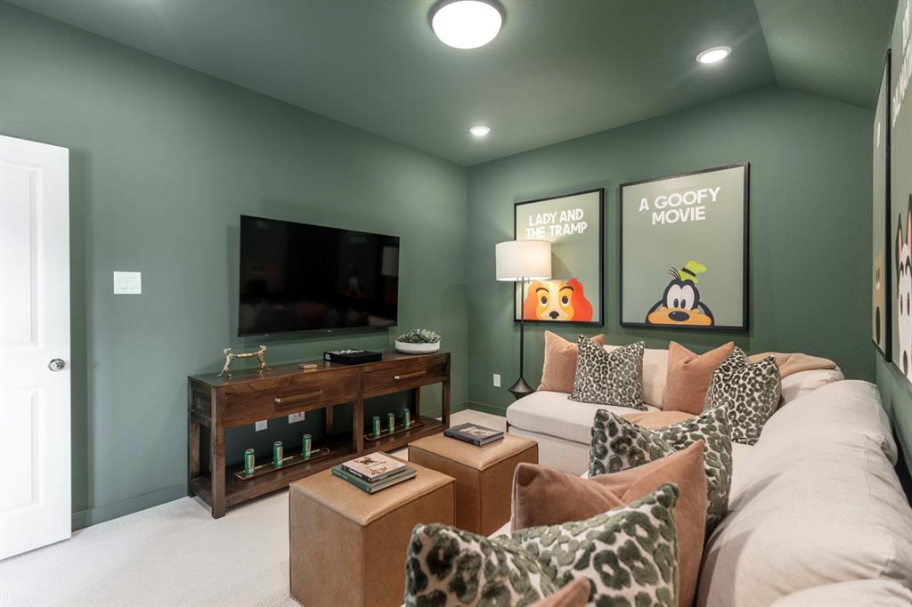 11505 Hardwick Road Haslet, TX 76052 - Photo 35 of 39 a living room with furniture and a flat screen tv
