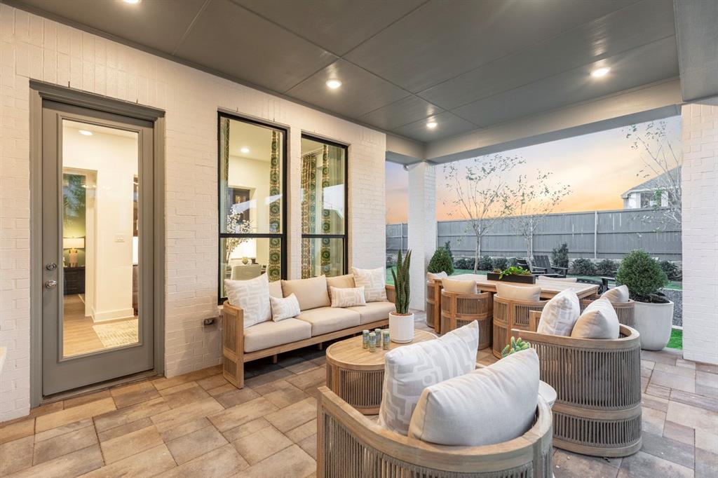 11505 Hardwick Road Haslet, TX 76052 - Photo 37 of 39 a living room with furniture and a floor to ceiling window