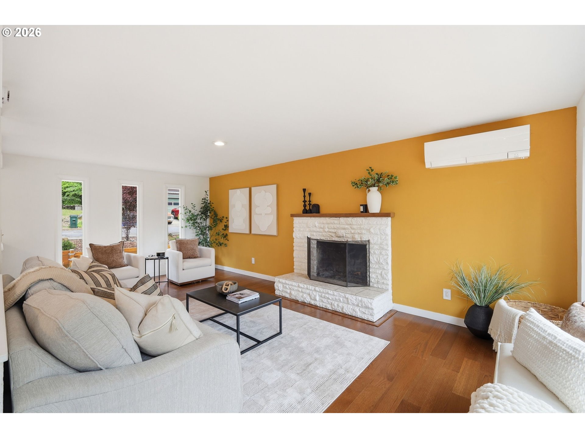 3834 Onyx Street Eugene, OR 97405 - Photo 14 of 43 a living room with furniture and a fireplace