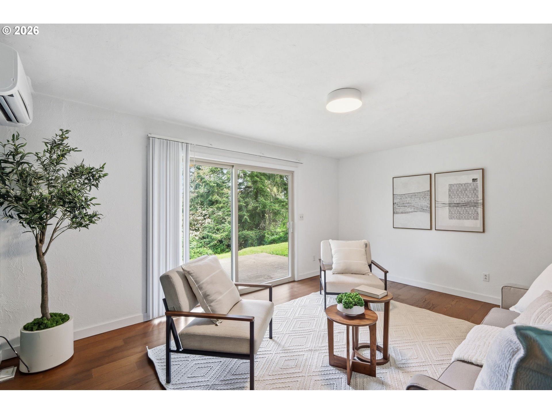 3834 Onyx Street Eugene, OR 97405 - Photo 25 of 43 a living room with furniture and a potted plant