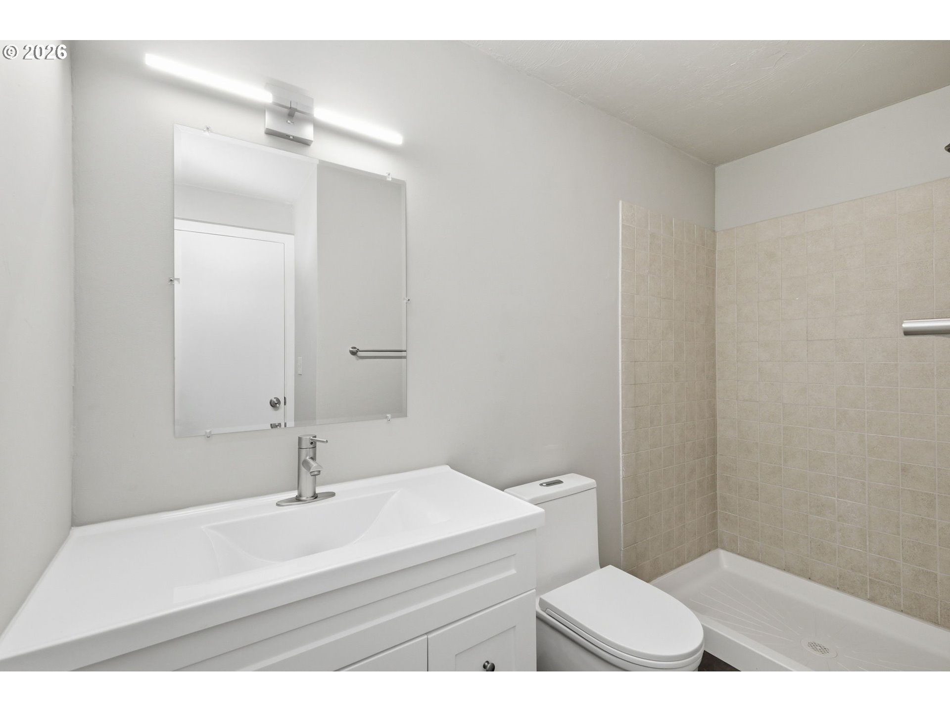 3834 Onyx Street Eugene, OR 97405 - Photo 27 of 43 a bathroom with a sink and a mirror