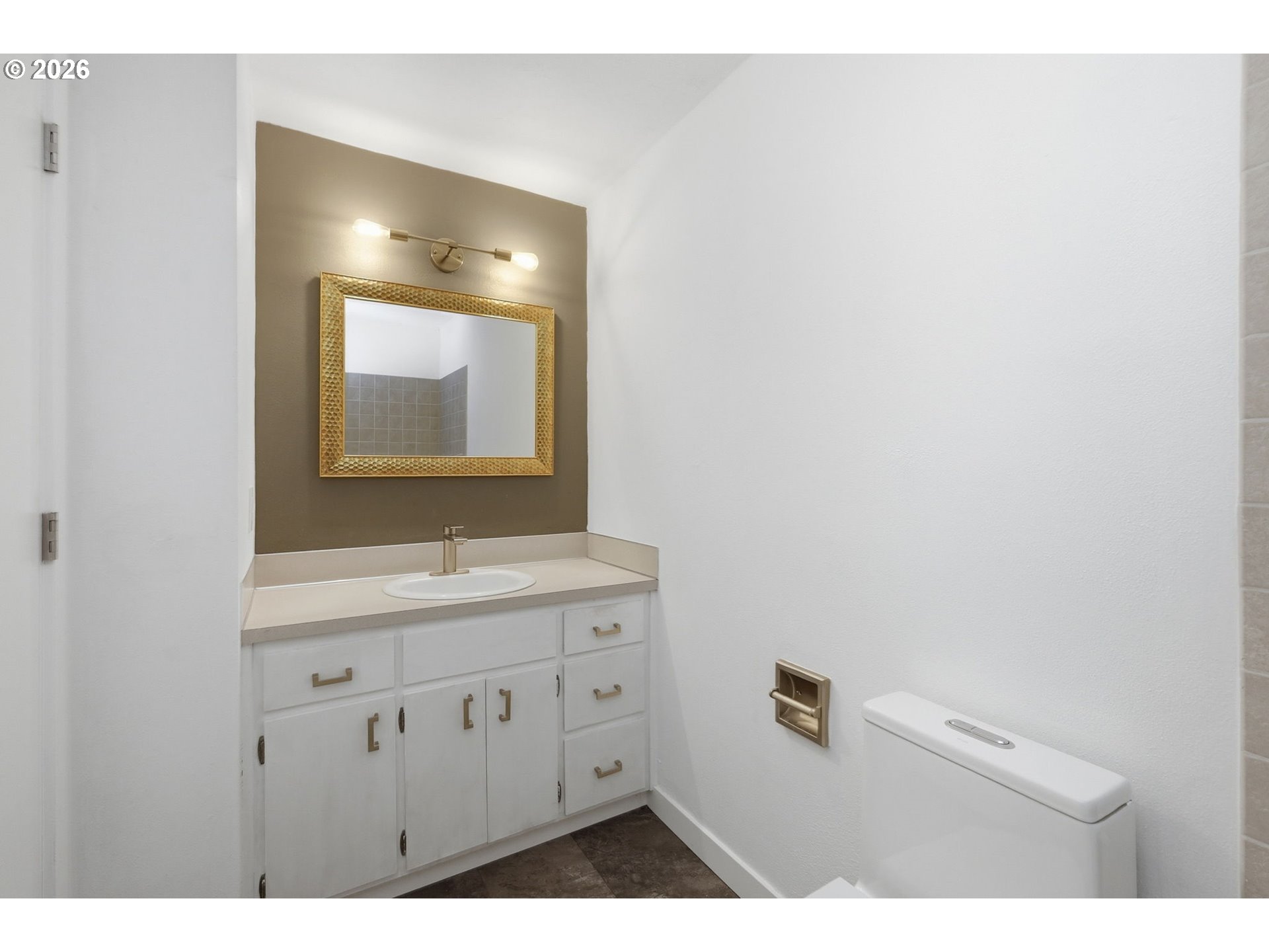 3834 Onyx Street Eugene, OR 97405 - Photo 31 of 43 a bathroom with a sink vanity and mirror