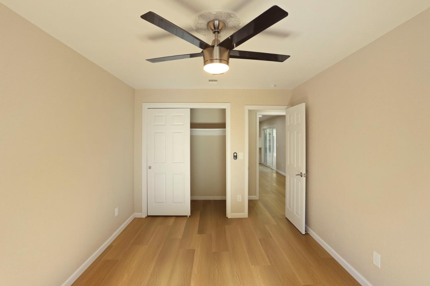 3524 Marsala Way Modesto, CA 95356 - Photo 25 of 40 a view of a livingroom with a ceiling fan & a ceiling fan