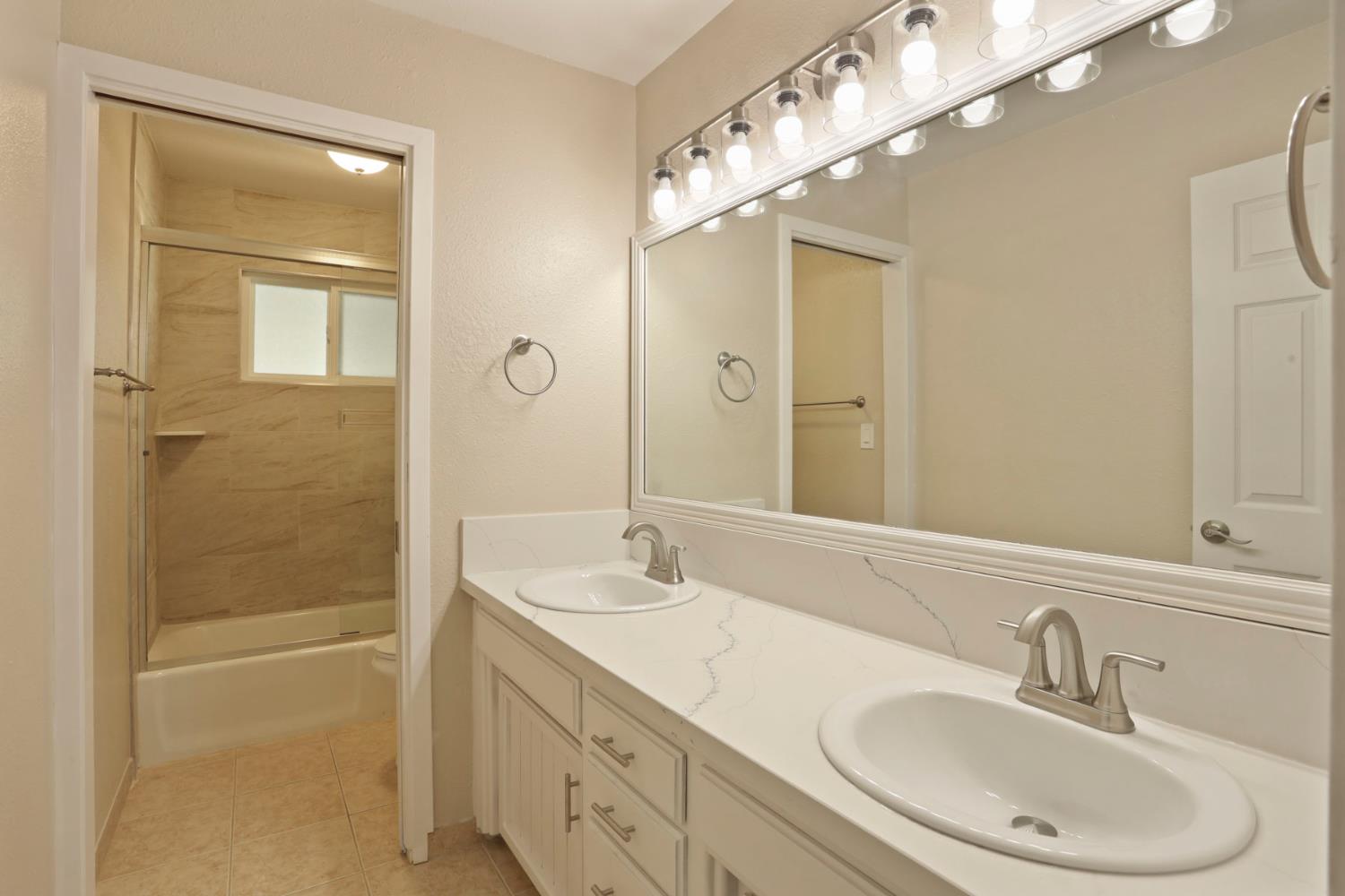 3524 Marsala Way Modesto, CA 95356 - Photo 28 of 40 a bathroom with a sink and a mirror