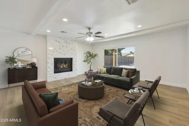 a view of a kitchen with a sink and a living room