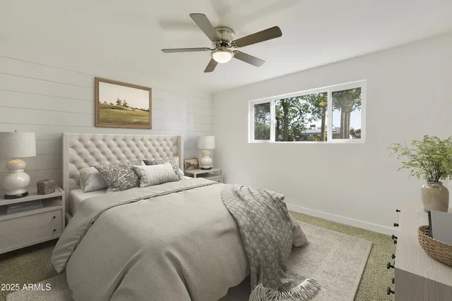 a view of a kitchen with a sink and a refrigerator