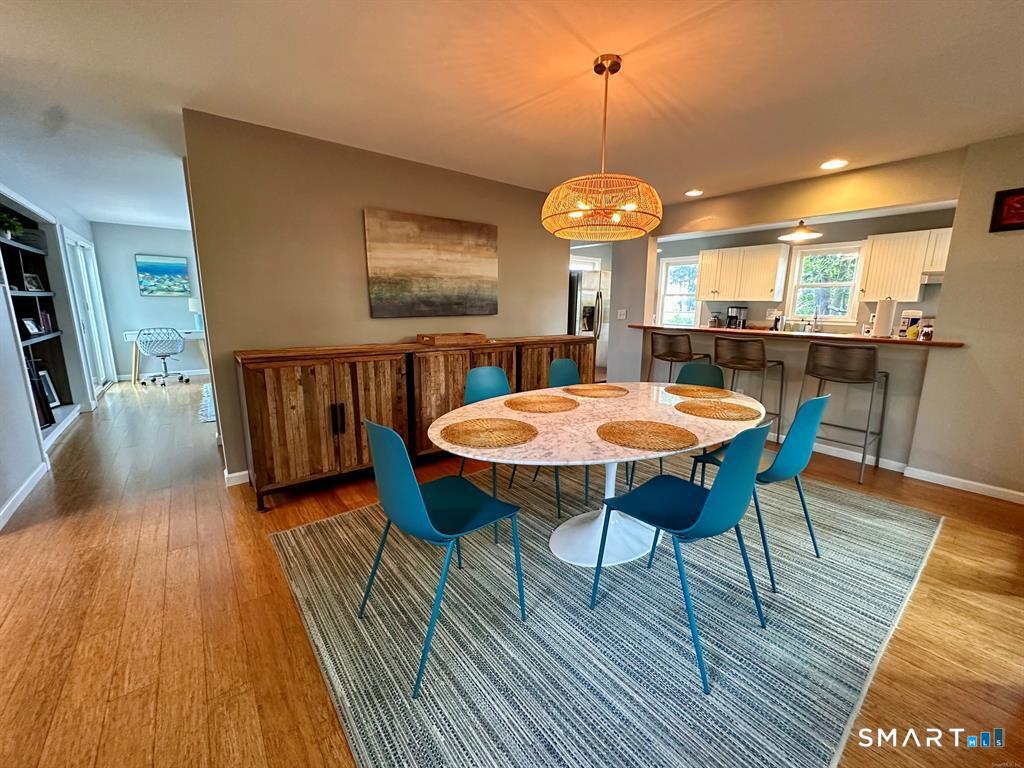 44 Warren Street Milford, CT 06460 - Photo 7 of 29 a view of a dining room with furniture window and wooden floor