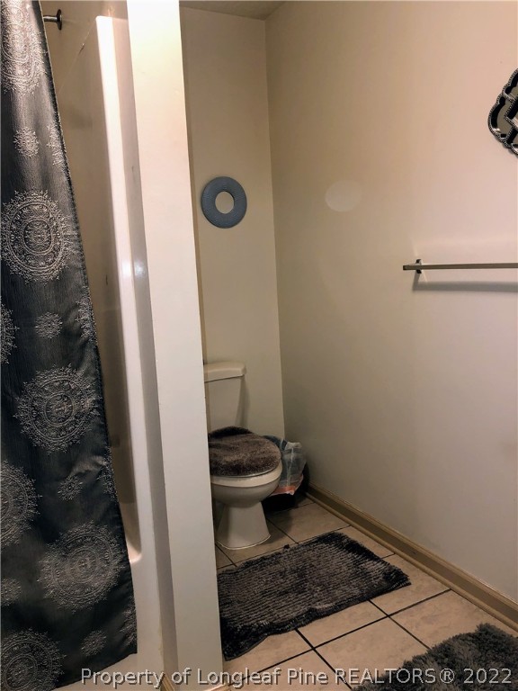 1828 Sardonyx Road, Unit 3 Fayetteville, NC 28303 - Photo 16 of 22 a bathroom with a sink and a toilet