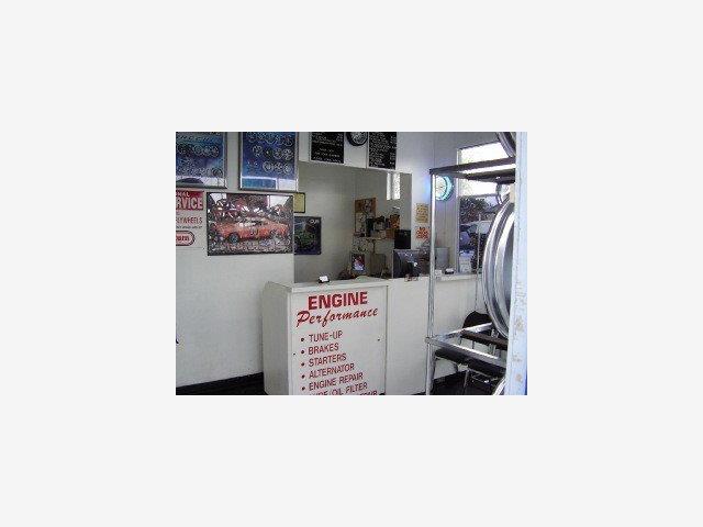 451 West Tennyson Road Hayward, CA 94544 - Photo 5 of 7 a picture of a room with a white cabinet and a refrigerator