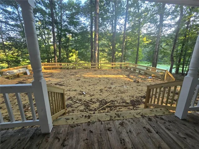 a view of a porch with a tree