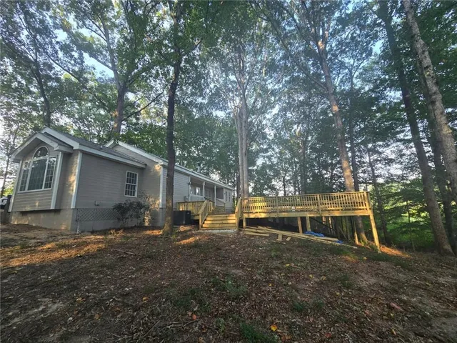 a view of house with outdoor space