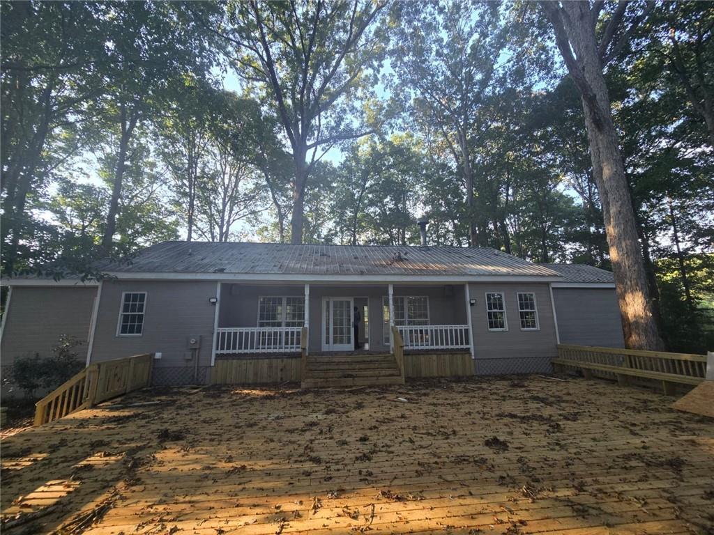 3738 Harmony Church Road Gainesville, GA 30507 - Photo 10 of 12 front view of a house with a yard