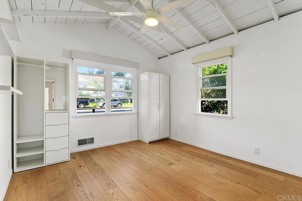 721 3rd Street Encinitas, CA 92024 - Photo 12 of 36 a view of a kitchen with refrigerator and window