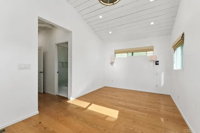 a view of an empty room and window