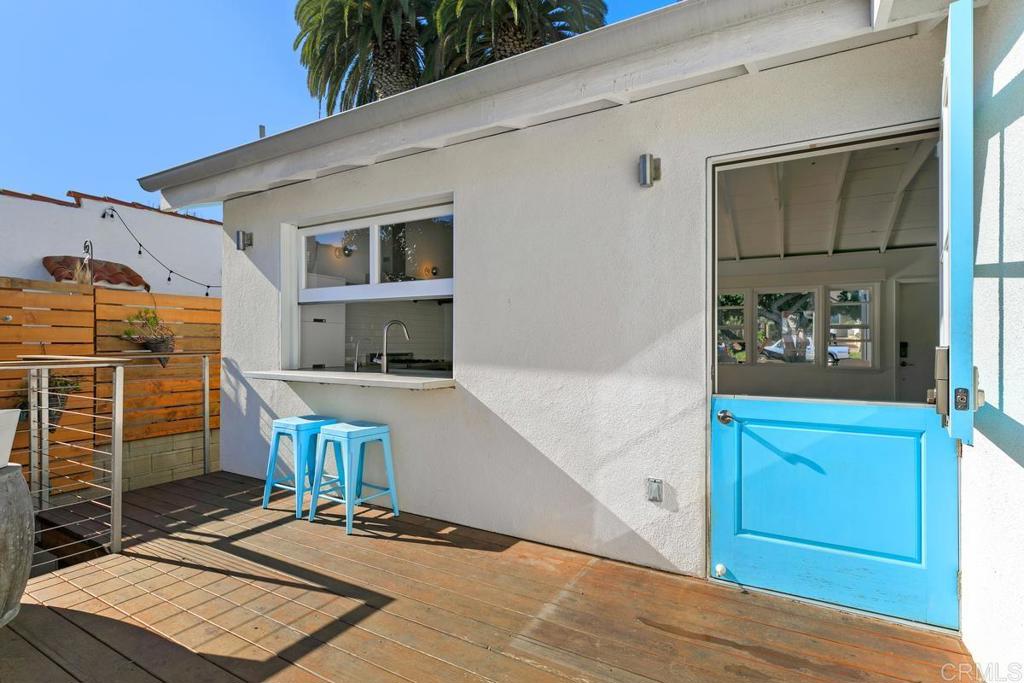 721 3rd Street Encinitas, CA 92024 - Photo 20 of 36 a front view of a house with a garage