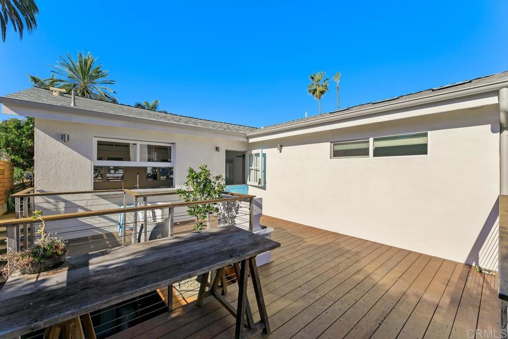 721 3rd Street Encinitas, CA 92024 - Photo 22 of 36 a view of a terrace with furniture