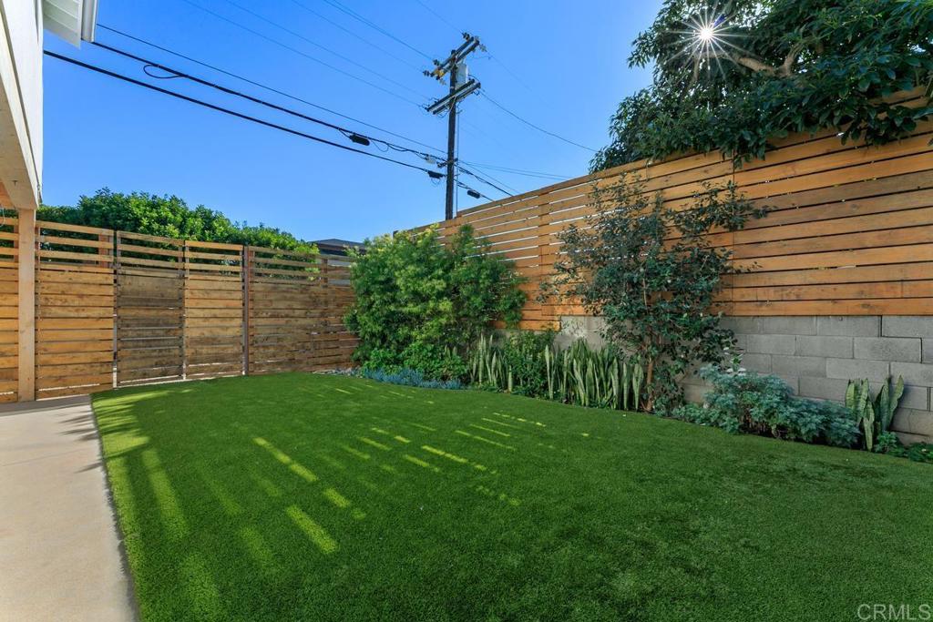 721 3rd Street Encinitas, CA 92024 - Photo 23 of 36 a backyard of a house with lots of green space