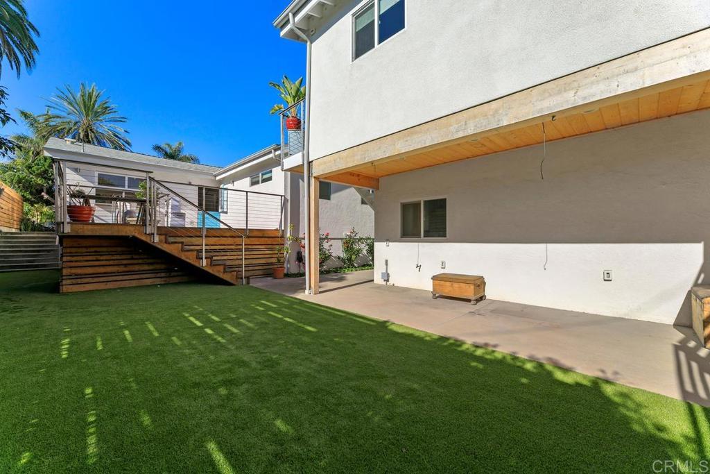 721 3rd Street Encinitas, CA 92024 - Photo 24 of 36 a view of a house with backyard and sitting area
