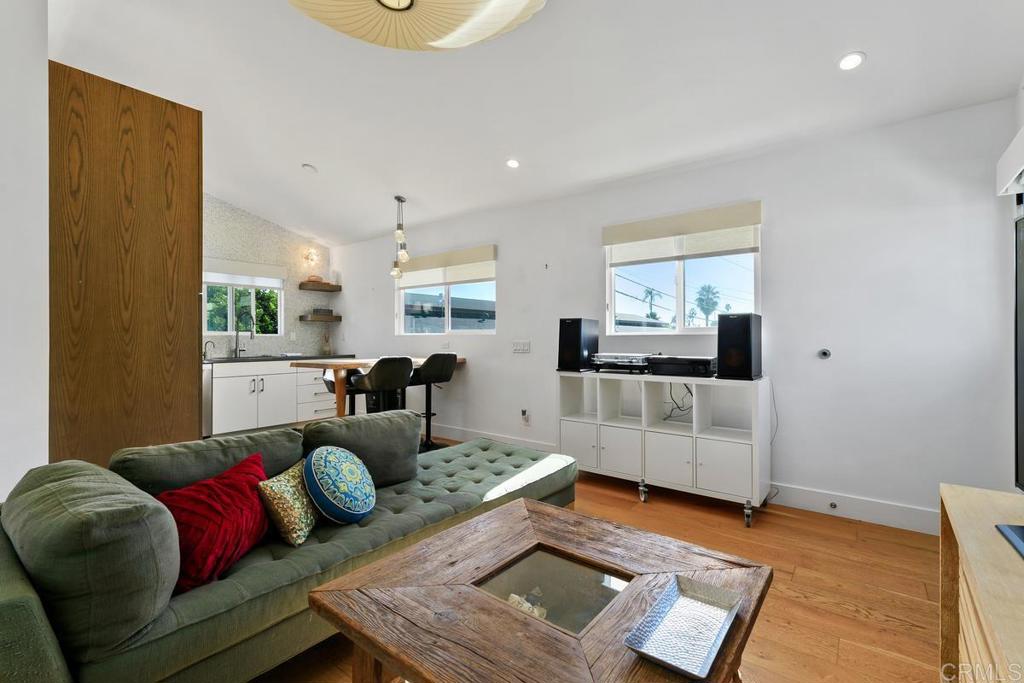 721 3rd Street Encinitas, CA 92024 - Photo 27 of 36 a living room with furniture and a couch
